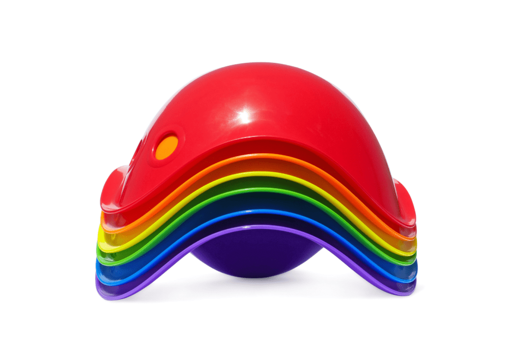 Bilibo open-ended toy for kids, Bilibo rocking and spinning toy for toddlers, versatile toy for imaginative play, bright shell-shaped toy for indoor and outdoor play, award-winning Bilibo for balance and motor skills, creative play toy for boys and girls, outdoor sensory play toy for toddlers, Bilibo stacking and carrying toy, toy for building balance and coordination, Montessori-inspired imaginative play toy, The Montessori Room, Toronto, Ontario, Canada.