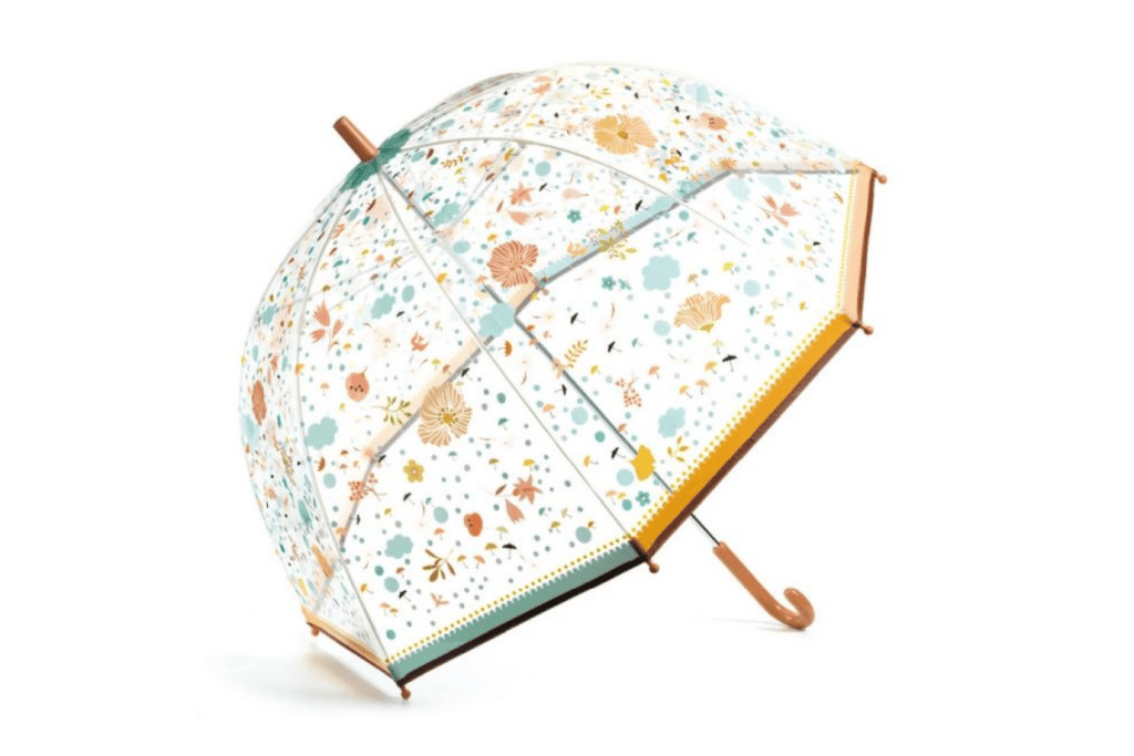 Djeco clear umbrella with floral pattern on a white background