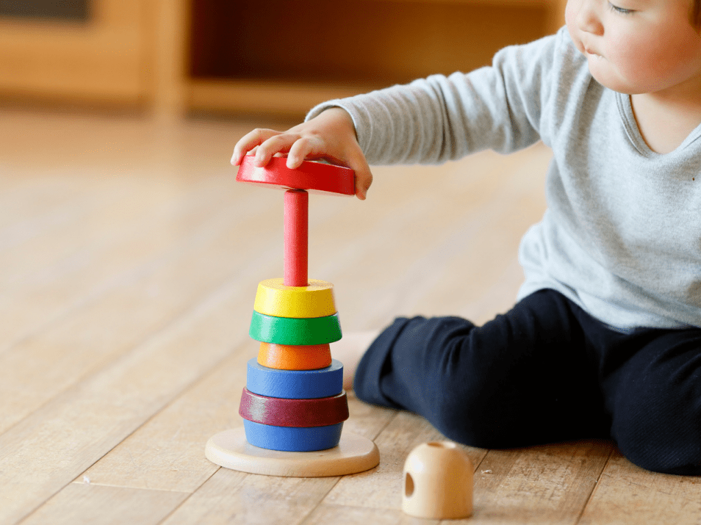 Why does Montessori use the term "work" instead of play?
