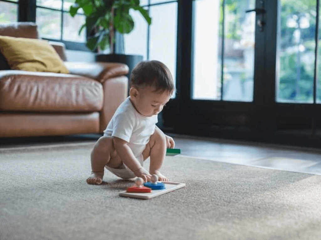 Writing Activities Starting in Infancy - How Montessori Uses Puzzles To Teach Handwriting at 6 Months+