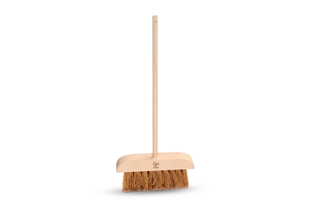 Children’s Outdoor Broom, Hape, care of the outdoor environment, Montessori practical life skills, gardening tools for children, child sized broom, The Montessori Room, Toronto, Ontario, Canada. 