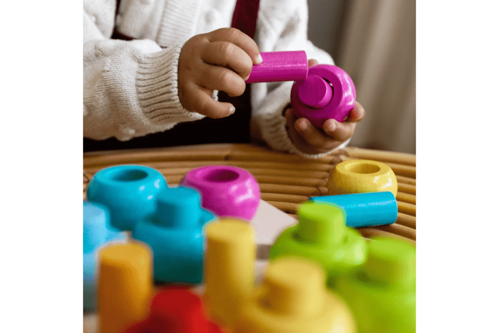 Rainbow Whirls Wooden Sorting and Stacking Game