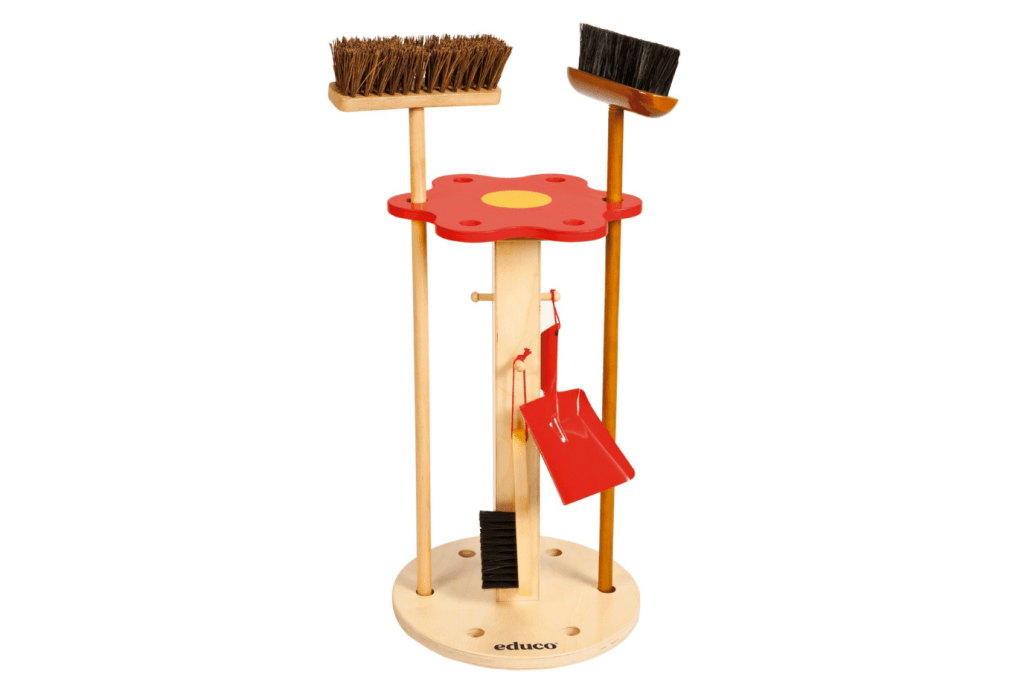 Wooden Broom Stand by Educo, Practical life materials, Montessori classroom materials, storage for child-sized cleaning tools, The Montessori Room, Toronto, Ontario, Canada.