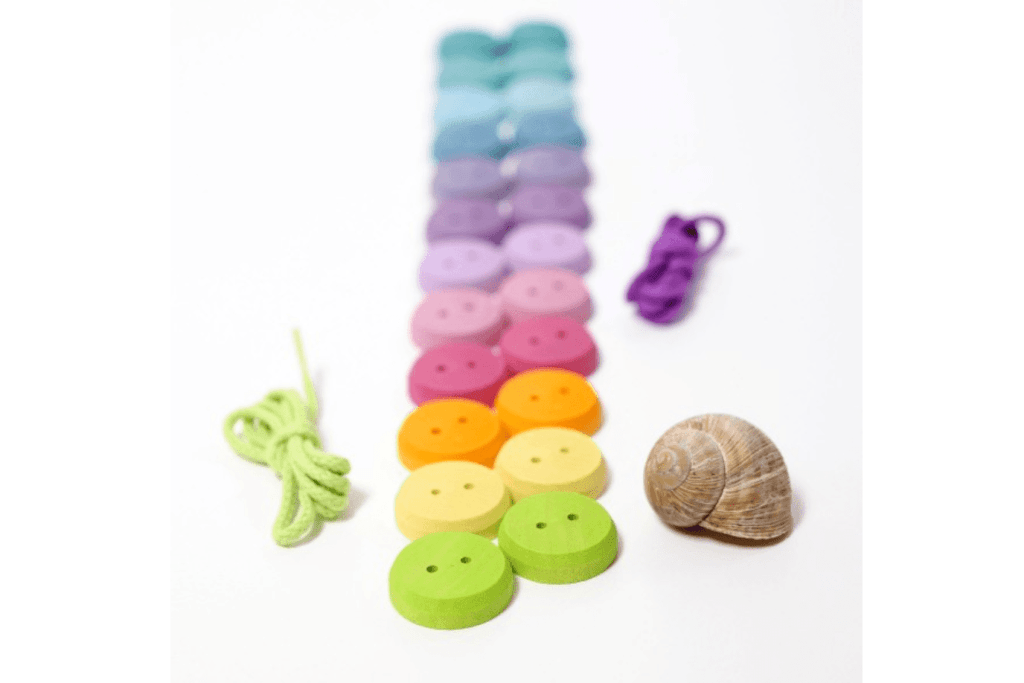 Grimm's Wooden Threading Buttons, Pastel colours, Grimm's Toys, wooden buttons, threading activities, threading for 4 year olds, fine motor toys, educational toys, The Montessori Room, Toronto, Ontario, Canada