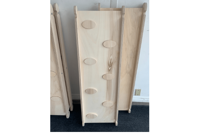 Pikler ramp, imperfections in wood, discount, 30% off, perfectly functional, safe for children, Made in Canada, wooden ramp, Montessori climbing triangle ramp, Pikler slide, Toronto, Ontario, Canada, oval ramp, The Montessori Room