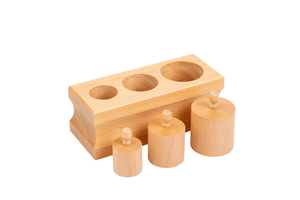 Montessori Infant Toddler Cylinder Block (No. 1), GAM Montessori materials, Montessori sensorial material, Montessori materials that develop visual discrimination skills by size, mini cylinder blocks for infants and toddlers, knobbed cylinder blocks for infants and toddlers, Montessori materials that help to develop hand-eye coordination and fine motor skills, The Montessori Room, Toronto, Ontario.