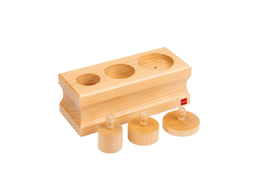 Montessori Infant Toddler Cylinder Block (No. 3), GAM Montessori materials, Montessori sensorial material, Montessori materials that develop visual discrimination skills by size, mini cylinder blocks for infants and toddlers, knobbed cylinder blocks for infants and toddlers, Montessori materials that help to develop hand-eye coordination and fine motor skills, The Montessori Room, Toronto, Ontario.