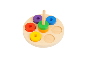 Stack the Rings, The Montessori Room, Toronto, Ontario, infant toys, toys for infants, toys that develop fine motor skills, Montessori Infant materials, toys that develop hand eye coordination, toys that introduce colours, Montessori Infant. The Play Kits by Lovevery, Lovevery, Montessori toy subscription, buy Lovevery item individually, Lovevery Canada, Lovevery in store, The Babbler Play kit, Months 13-15