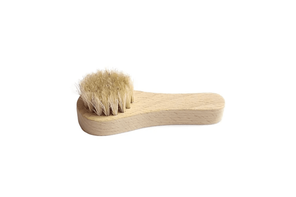 Montessori Wooden Shoe Brush, boar bristles, child-sized shoe brush, cleaning shoes, brushing shoes, practical life exercises, care of the self, The Montessori Room, Toronto, Ontario, Canada. 